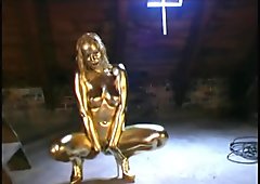 Golden painted Renata showing pussy