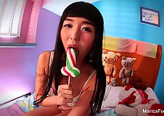 Japanese starlet Marica Hase plays with candy cock